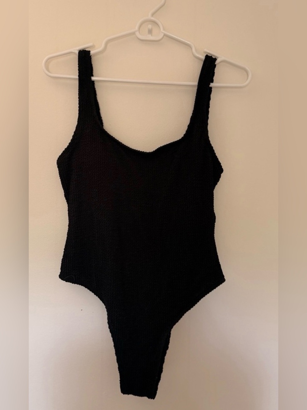 Black textured high leg cut one piece swim - M